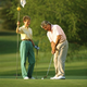 PlatinumPlus citizens Connie and Russell Brodhagen of Del Mar, CA, enjoy a round of golf in a members-only, walled-in golfing facility in East Los Angeles, undisturbed by the surrounding war zone of urban poverty.